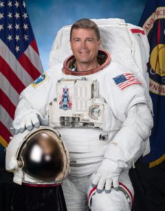 Official individual astronaut portrait of Reid Wiseman in an EMU.  Photo Date: August 6, 2015.  Location: Building 8, Room 183 - Photo Studio.  Photographer: Robert Markowitz